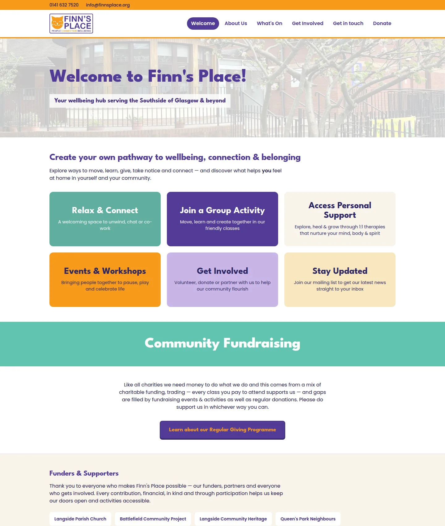 The rebuilt home page: orange header bar with the Finn's Place logo, six coloured tiles for the main routes, and a Community Fundraising banner